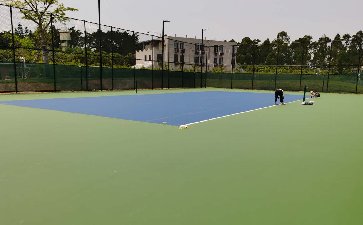 光明計委進口丙烯酸網球場施工